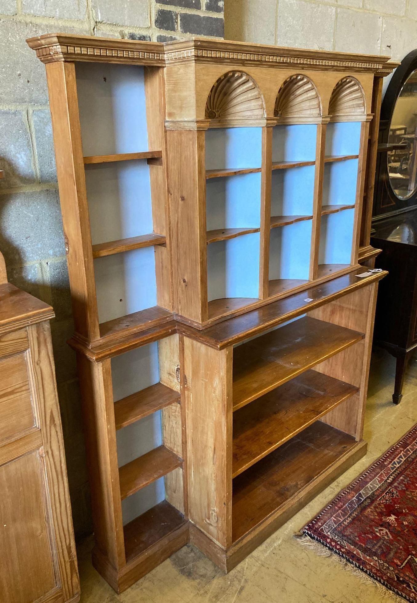 A pine breakfront open bookcase, width 172cm height 176cm